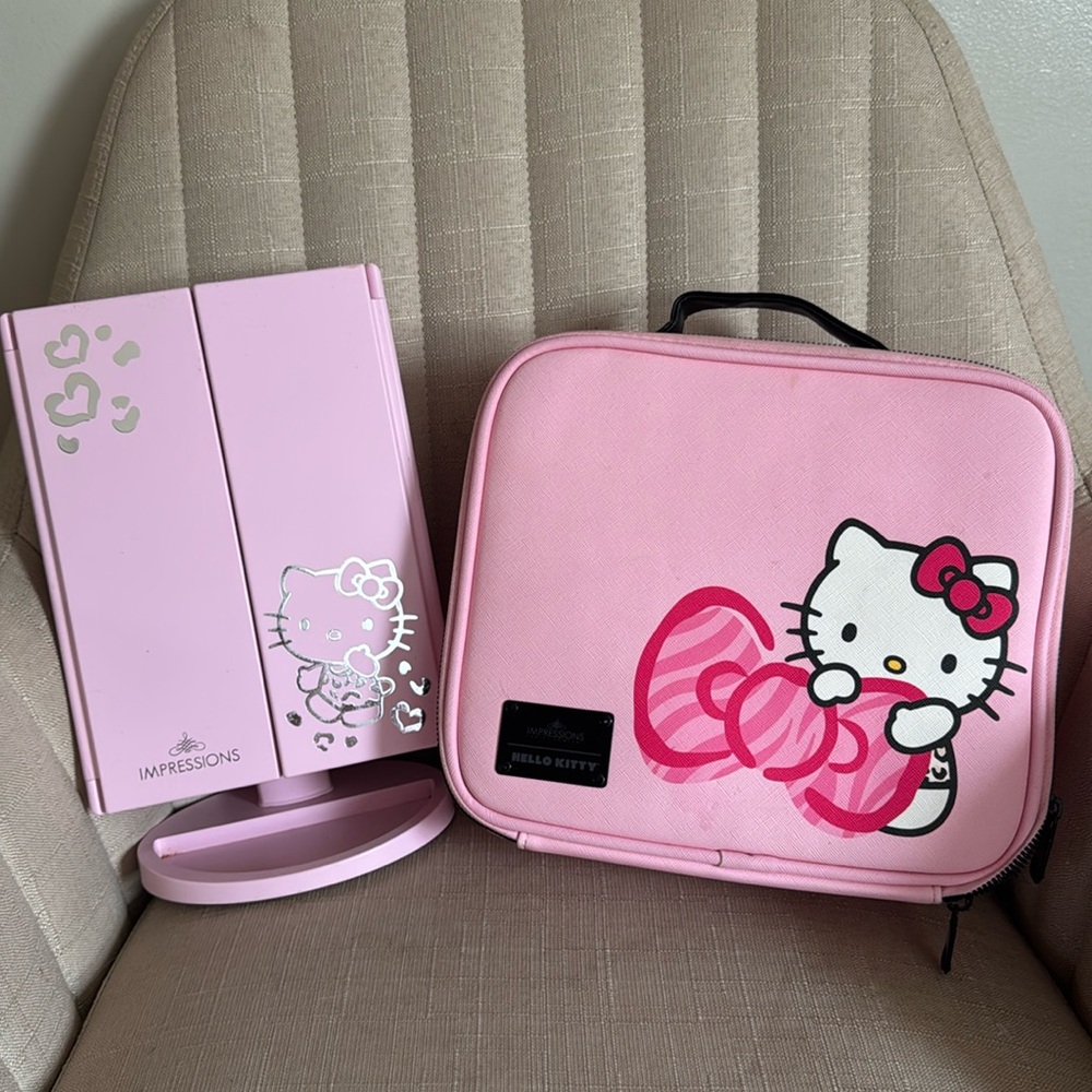 Impressions  hello  kitty make mirror and Hello Kitty Cosmetic Bag.